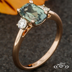 Rose gold ring with sale green stone